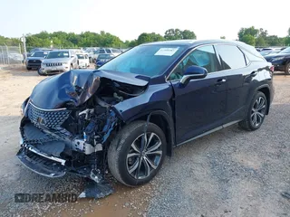 2022 Lexus RX 350 with VIN 2T2HZMAA5NC232352, listed as a IAAI auction lot 42399381 with 13,359 mi miles and . Bid and sale history available at DreamBid. Image 2.