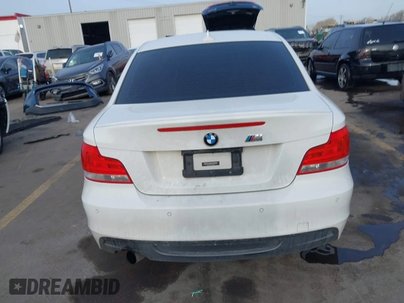 2013 BMW 1 Series 135i with VIN WBAUC9C52DVM13628, listed as a IAAI auction lot 41901475 with 113,598 mi miles and . Bid and sale history available at DreamBid. Image 16.
