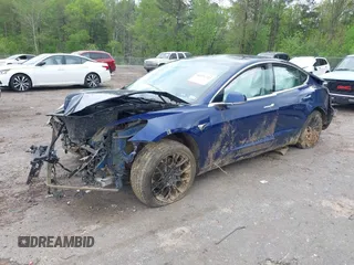 2019 Tesla Model 3 Mid Range z VIN 5YJ3E1EAXKF332974, wystawiony jako IAAI lot #41921722 z przebiegiem Nie podano mil oraz . Historia ofert i sprzedaży dostępna na DreamBid. Obrazek 17.
