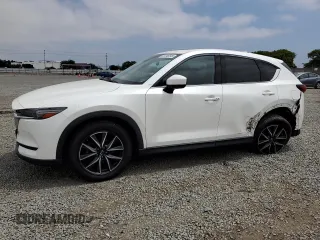 2018 Mazda CX-5 Grand Touring with VIN JM3KFADMXJ1358221, listed as a Copart auction lot 59746545 with 54,094 mi miles and Salvage title. Bid and sale history available at DreamBid. Image 1.