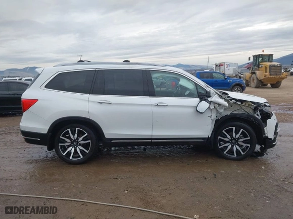 2021 Honda Pilot Elite with VIN 5FNYF6H03MB044154, listed as a IAAI auction lot 41050202 with 60,331 mi miles. Bid and sale history available at carsss.com. Image 13.