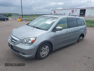2007 Honda Odyssey EX-L z VIN 5FNRL38717B124209, wystawiony jako IAAI lot #42444334 z przebiegiem 230 123 mil mil oraz . Historia ofert i sprzedaży dostępna na DreamBid. Obrazek 2.