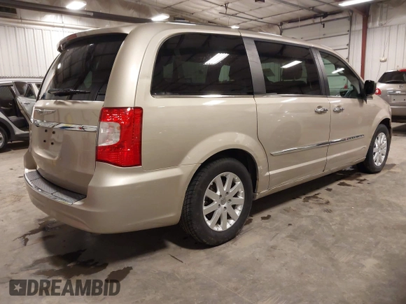 2014 Chrysler Town & Country Touring with VIN 2C4RC1BG2ER422914, listed as a IAAI auction lot 42017742 with 49,856 mi miles and . Bid and sale history available at DreamBid. Image 4.