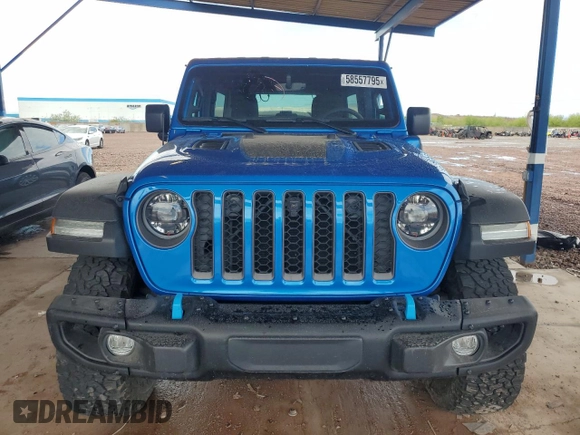 2023 Jeep Wrangler Rubicon with VIN 1C4JJXR69PW581362, listed as a Copart auction lot 58557795 with 34,357 mi miles and Salvage title. Bid and sale history available at DreamBid. Image 5.
