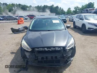 2017 Ford Focus Titanium with VIN 1FADP3J27HL306546, listed as a IAAI auction lot 42480576 with 114,285 mi miles and . Bid and sale history available at DreamBid. Image 13.