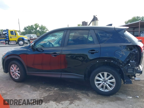 2016 Mazda CX-5 Touring with VIN JM3KE2CY5G0653108, listed as a IAAI auction lot 37717249 with 90,704 mi miles and . Bid and sale history available at DreamBid. Image 15.