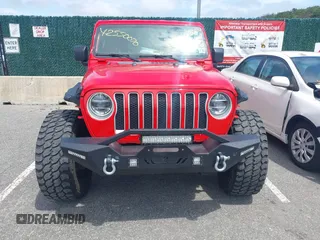 2021 Jeep Wrangler Unlimited Sahara z VIN 1C4HJXEGXMW631033, wystawiony jako IAAI lot #42550070 z przebiegiem 54 429 mil mil oraz . Historia ofert i sprzedaży dostępna na DreamBid. Obrazek 6.