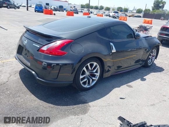 2015 Nissan 370Z Sport with VIN JN1AZ4EH3FM441836, listed as a IAAI auction lot 42094959 with 59,004 mi miles and . Bid and sale history available at DreamBid. Image 4.
