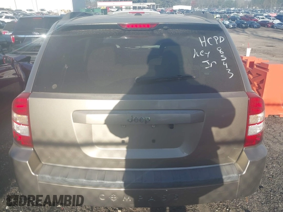 2007 Jeep Compass Sport with VIN 1J8FT47W57D158543, listed as a IAAI auction lot 41817636 with 241,439 mi miles. Bid and sale history available at carsss.com. Image 16.