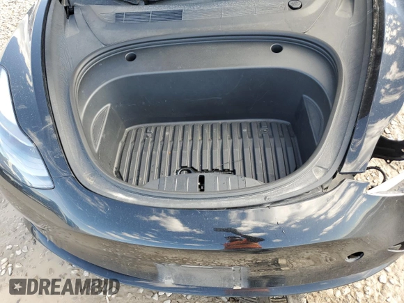 2023 Tesla Model 3 with VIN 5YJ3E1EAXPF708001, listed as a Copart auction lot 57252735 with 71,579 mi miles and Salvage title. Bid and sale history available at DreamBid. Image 11.