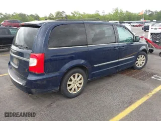 2014 Chrysler Town & Country Touring with VIN 2C4RC1BG1ER255056, listed as a IAAI auction lot 41951379 with 136,606 mi miles. Bid and sale history available at carsss.com. Image 4.