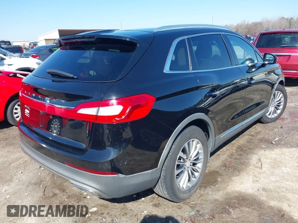 2016 Lincoln MKX Select with VIN 2LMTJ6KR9GBL59252, listed as a IAAI auction lot 41608092 with 144,128 mi miles. Bid and sale history available at carsss.com. Image 4.