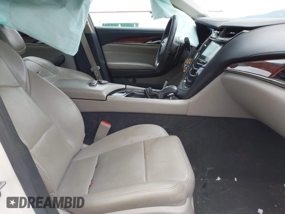 2014 Cadillac CTS Luxury AWD with VIN 1G6AX5S3XE0184524, listed as a IAAI auction lot 42260852 with 139,667 mi miles and . Bid and sale history available at DreamBid. Image 5.