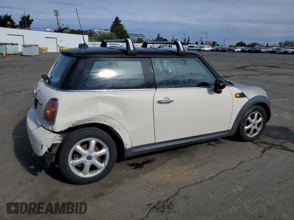 2010 MINI Hardtop with VIN WMWMF3C57ATU77370, listed as a Copart auction lot 50078605 with 187,187 mi miles and Salvage title. Bid and sale history available at DreamBid. Image 3.