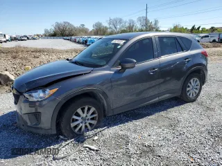 2014 Mazda CX-5 Sport z VIN JM3KE2BE6E0343490, wystawiony jako Copart lot #45373055 z przebiegiem 109 669 mil mil oraz Szkoda całkowita • Salvage title. Historia ofert i sprzedaży dostępna na DreamBid. Obrazek 1.