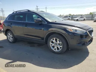 2015 Mazda CX-9 Touring z VIN JM3TB3CV1F0460073, wystawiony jako Copart lot #53841725 z przebiegiem 87 520 mil mil oraz Szkoda całkowita • Salvage title. Historia ofert i sprzedaży dostępna na DreamBid. Obrazek 4.