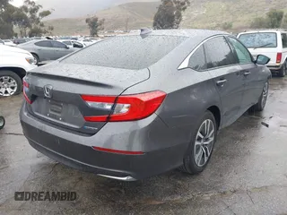 2020 Honda Accord with VIN 1HGCV3F13LA015933, listed as a IAAI auction lot 41720543 with 64,943 mi miles and . Bid and sale history available at DreamBid. Image 4.