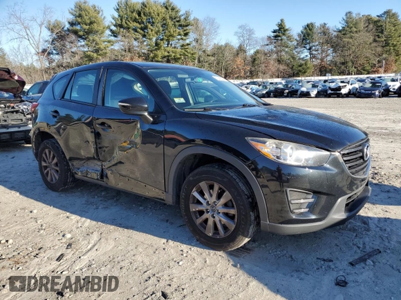 2016 Mazda CX-5 Sport with VIN JM3KE2BE1G0629430, listed as a Copart auction lot 82442654 with 130,289 mi miles and Salvage Title. Bid and sale history available at DreamBid. Image 4.