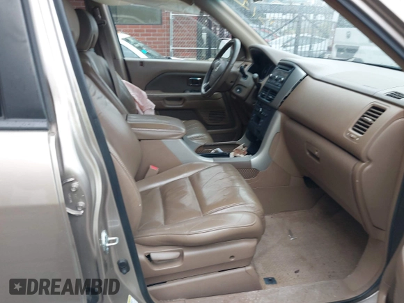 2006 Honda Pilot EX-L with VIN 2HKYF18516H528116, listed as a IAAI auction lot 41782324 with 245,280 mi miles and . Bid and sale history available at DreamBid. Image 5.