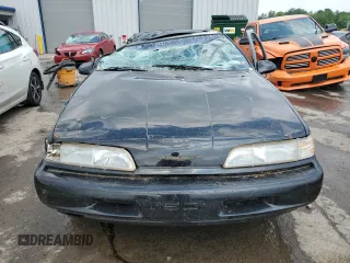 1989 Ford Thunderbird z VIN 1FAPP64R0KH161691, wystawiony jako Copart lot #60097275 z przebiegiem 70 041 mil mil oraz Szkoda całkowita • Salvage title. Historia ofert i sprzedaży dostępna na DreamBid. Obrazek 5.