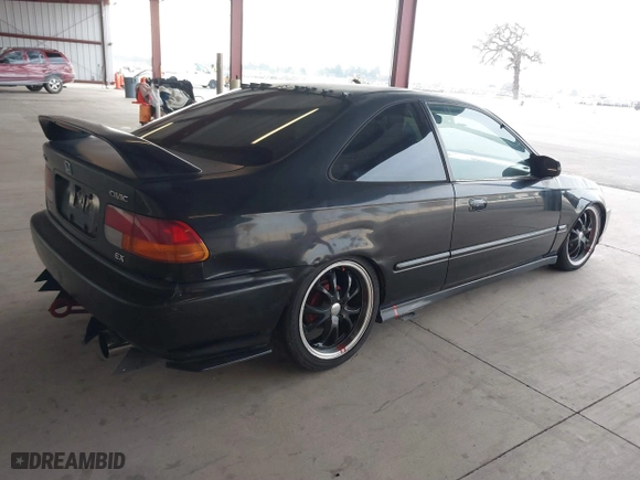 1998 Honda Civic EX with VIN 1HGEJ8246WL081080, listed as a IAAI auction lot 41435439 with 188,999 mi miles. Bid and sale history available at carsss.com. Image 4.