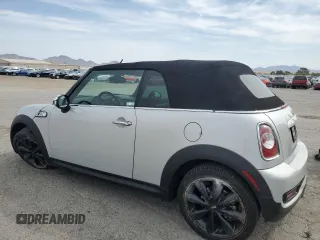2014 MINI Convertible S with VIN WMWZP3C53ET707205, listed as a Copart auction lot 52179175 with 101,209 mi miles and Salvage Title. Bid and sale history available at DreamBid. Image 2.