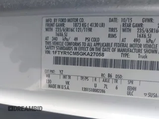 2016 Ford Transit Cargo with VIN 1FTYR1CM5GKA27058, listed as a IAAI auction lot 41753527 with 112,824 mi miles and . Bid and sale history available at DreamBid. Image 9.