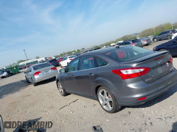 2014 Ford Focus Titanium with VIN 1FADP3J24EL241067, listed as a IAAI auction lot 42093101 with 1 mi miles. Bid and sale history available at carsss.com. Image 3.