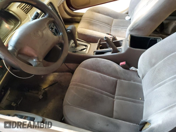 1997 Toyota Camry LE z VIN 4T1BG22K1VU033230, wystawiony jako Copart lot #52619265 z przebiegiem 301 543 mil mil oraz Szkoda całkowita • Salvage title. Historia ofert i sprzedaży dostępna na DreamBid. Obrazek 7.