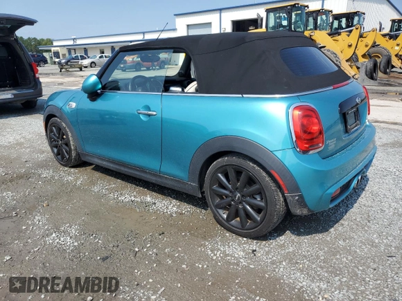 2018 MINI Convertible Cooper S with VIN WMWWG9C59J3C82446, listed as a Copart auction lot 72790934 with 56,875 mi miles and Salvage Title. Bid and sale history available at carsss.com. Image 2.