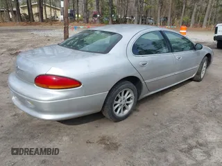 2001 Chrysler LHS z VIN 2C3HC56G81H540175, wystawiony jako IAAI lot #41751981 z przebiegiem 212 941 mil mil oraz . Historia ofert i sprzedaży dostępna na DreamBid. Obrazek 4.