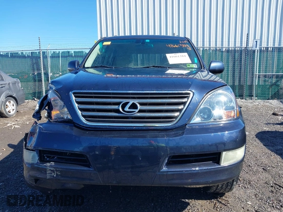 2005 Lexus GX with VIN JTJBT20XX50081621, listed as a IAAI auction lot 41661384 with 208,071 mi miles. Bid and sale history available at carsss.com. Image 12.