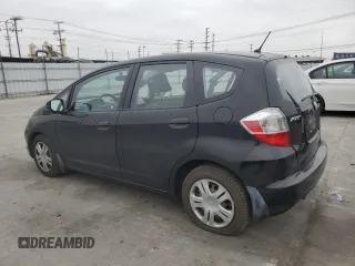 2010 Honda Fit with VIN JHMGE8H24AS010748, listed as a Copart auction lot 53756565 with 65,302 mi miles and Salvage Title. Bid and sale history available at carsss.com. Image 2.