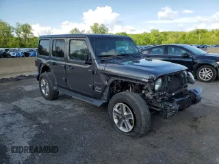 2022 Jeep Wrangler Unlimited Sahara z VIN 1C4HJXEN0NW110192, wystawiony jako Copart lot #57206625 z przebiegiem 32 964 mil mil oraz Szkoda całkowita • Salvage title. Historia ofert i sprzedaży dostępna na DreamBid. Obrazek 4.
