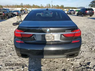 2016 BMW 7 Series 750i with VIN WBA7F0C5XGGL99048, listed as a Copart auction lot 84815364 with 96,743 mi miles and Salvage Title. Bid and sale history available at carsss.com. Image 6.