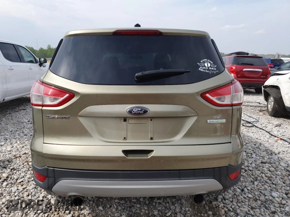 2013 Ford Escape SE with VIN 1FMCU0G95DUA54779, listed as a Copart auction lot 58428065 with 195,284 mi miles and Clean title. Bid and sale history available at DreamBid. Image 6.