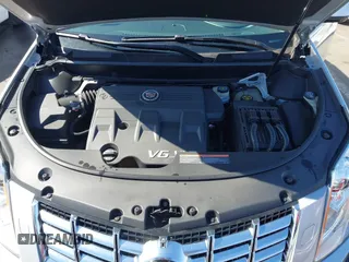 2013 Cadillac SRX Premium Collection z VIN 3GYFNEE36DS556446, wystawiony jako IAAI lot #42289824 z przebiegiem 23 988 mil mil oraz . Historia ofert i sprzedaży dostępna na DreamBid. Obrazek 10.