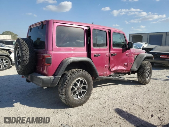 2024 Jeep Wrangler Rubicon with VIN 1C4PJXFG9RW346079, listed as a Copart auction lot 77006914 with 2,446 mi miles and Salvage Title. Bid and sale history available at DreamBid. Image 3.