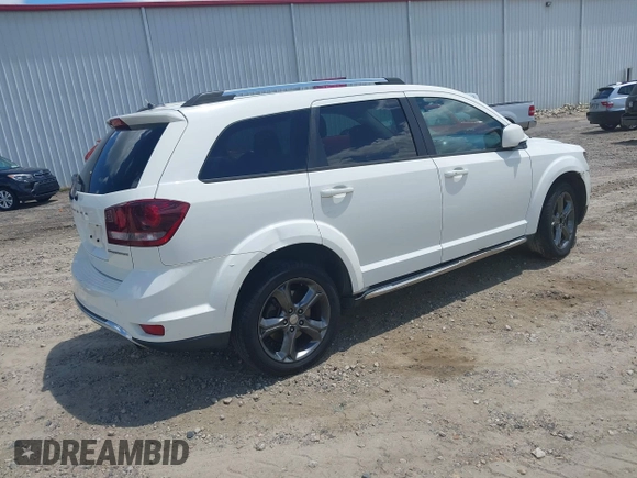 2015 Dodge Journey Crossroad with VIN 3C4PDCGB7FT723142, listed as a IAAI auction lot 42533562 with 217,413 mi miles and . Bid and sale history available at DreamBid. Image 4.