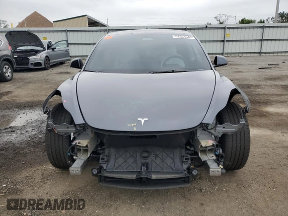 2023 Tesla Model 3 with VIN 5YJ3E1EA1PF678225, listed as a Copart auction lot 62634945 with 24,932 mi miles and Salvage title. Bid and sale history available at DreamBid. Image 5.