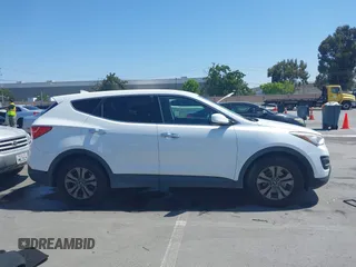 2016 Hyundai Santa Fe z VIN 5XYZT3LB9GG322900, wystawiony jako IAAI lot #42417788 z przebiegiem 160 621 mil mil oraz . Historia ofert i sprzedaży dostępna na DreamBid. Obrazek 13.