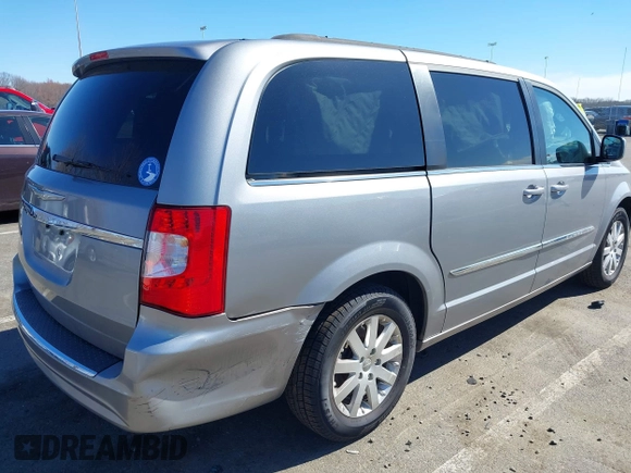 2013 Chrysler Town & Country Touring with VIN 2C4RC1BG9DR777819, listed as a IAAI auction lot 41824692 with 138,702 mi miles. Bid and sale history available at carsss.com. Image 6.