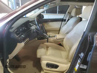 2015 BMW 5 Series 535i Gran Turismo xDrive with VIN WBA5M4C59FD184037, listed as a Copart auction lot 59118945 with 128,263 mi miles and Salvage title. Bid and sale history available at DreamBid. Image 7.
