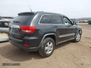 2011 Jeep Grand Cherokee Laredo with VIN 1J4RR4GGXBC506728, listed as a IAAI auction lot 41889334 with 236,099 mi miles. Bid and sale history available at carsss.com. Image 4.
