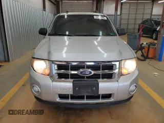 2010 Ford Escape XLT с VIN 1FMCU9D76AKB94757, выставлен на аукционе Copart как лот 55735585 с пробегом 175 030 миль миль и Списание • Salvage title. История ставок и продаж доступна на DreamBid. Изображение 5.