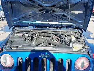 2010 Jeep Wrangler Unlimited Sport with VIN 1J4BA3H18AL105500, listed as a IAAI auction lot 41634465 with 230,453 mi miles. Bid and sale history available at carsss.com. Image 10.