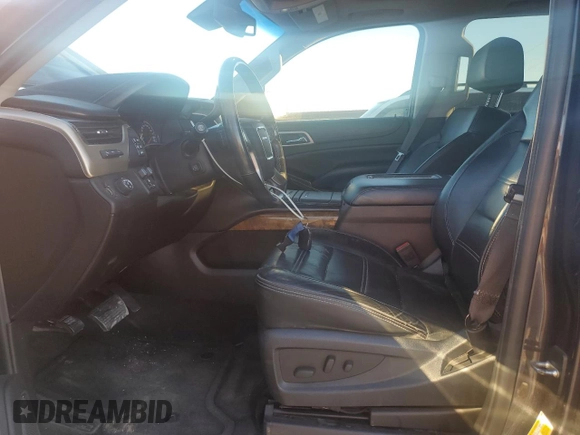 2015 GMC Yukon Denali with VIN 1GKS1CKJ7FR132677, listed as a Copart auction lot 82118584 with 144,798 mi miles and Salvage Title. Bid and sale history available at carsss.com. Image 7.