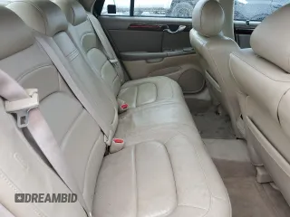2004 Cadillac DeVille DTS z VIN 1G6KF57944U117834, wystawiony jako Copart lot #89320975 z przebiegiem 149 820 mil mil oraz Szkody całkowita. Historia ofert i sprzedaży dostępna na DreamBid. Obrazek 10.