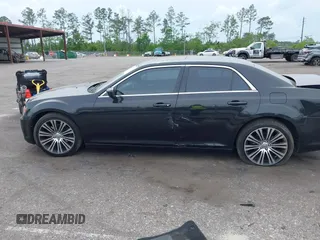 2013 Chrysler 300 with VIN 2C3CCABT2DH735764, listed as a IAAI auction lot 41977616 with 164,517 mi miles. Bid and sale history available at carsss.com. Image 14.