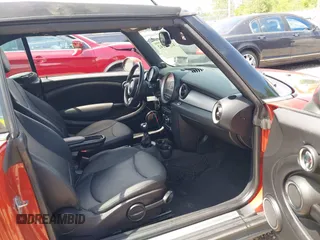 2011 MINI Convertible with VIN WMWZN3C57BTZ89303, listed as a IAAI auction lot 42352242 with 146,448 mi miles and . Bid and sale history available at DreamBid. Image 5.